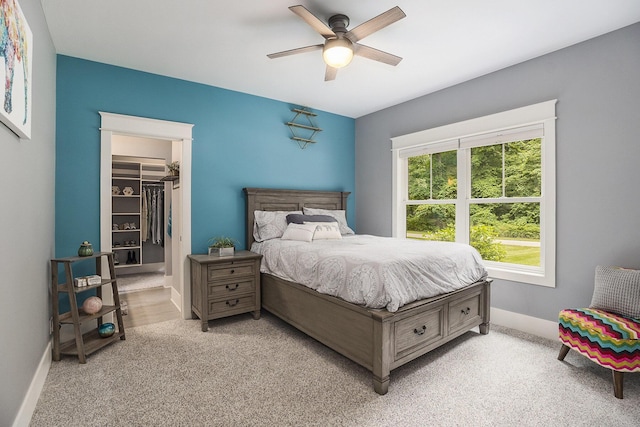 3479 Jeffrey Spur, Hamilton, MI 49419 - bedroom featuring light colored carpet, a ceiling fan, and a spacious closet