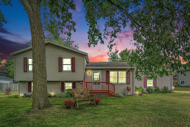 310 W 4th St, Lawton, MI 49065 - split level home with a front lawn