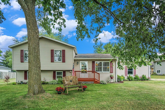 310 W 4th St, Lawton, MI 49065 - split level home featuring a front lawn