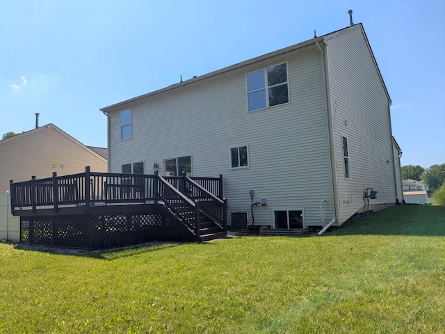 6766 Poplar Dr, Ypsilanti, MI 48197 - rear view of property with a wooden deck and a lawn