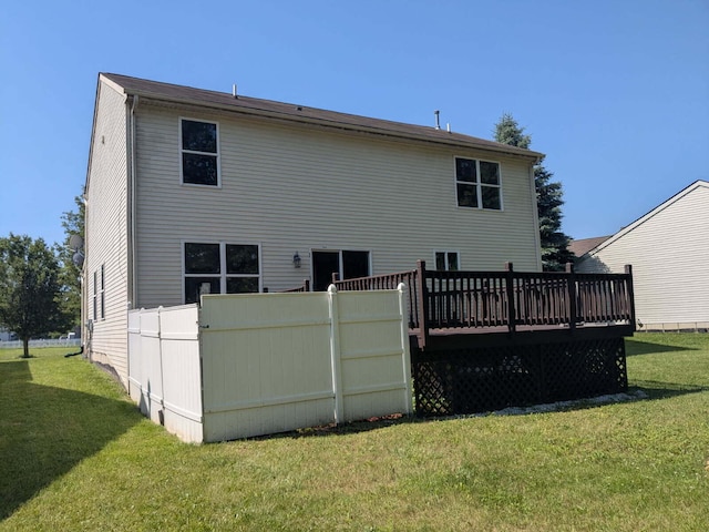 6766 Poplar Dr, Ypsilanti, MI 48197 - rear view of property with a wooden deck and a yard