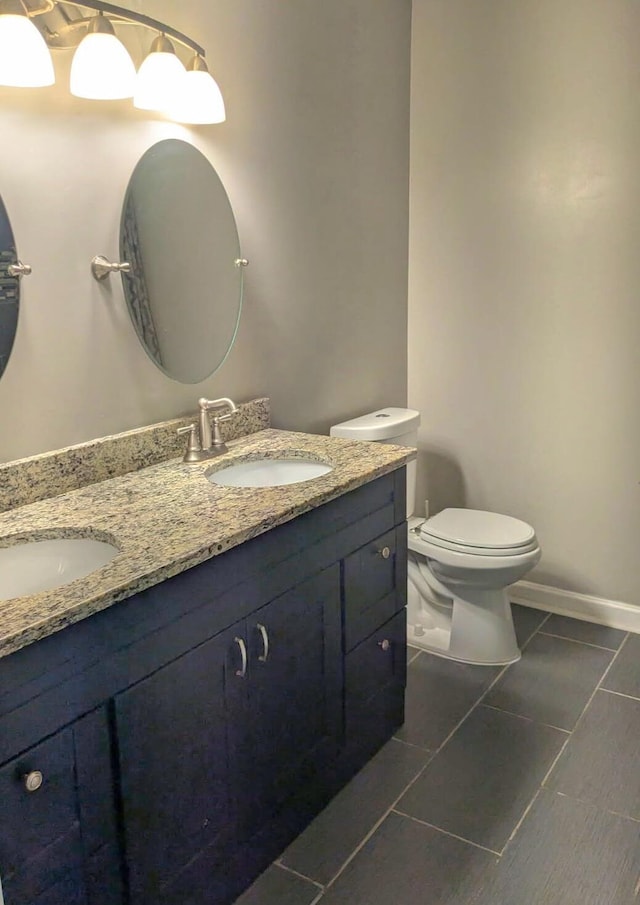 6766 Poplar Dr, Ypsilanti, MI 48197 - bathroom with double vanity and tile patterned floors