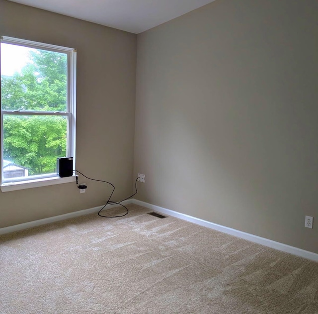 6766 Poplar Dr, Ypsilanti, MI 48197 - unfurnished room featuring healthy amount of natural light and carpet