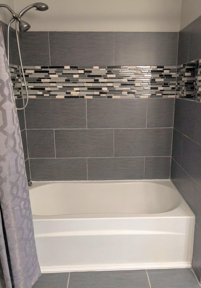 6766 Poplar Dr, Ypsilanti, MI 48197 - bathroom featuring tile patterned flooring and shower / bath combo