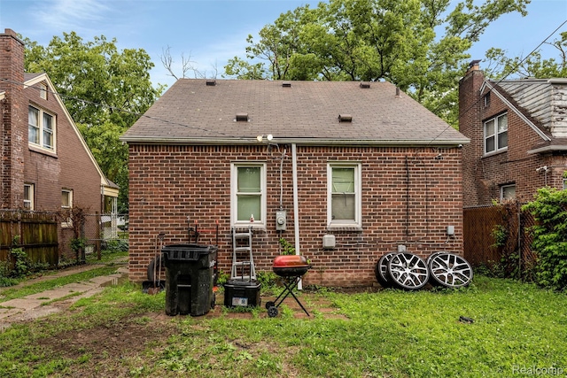 11358 Asbury Park, Detroit, MI 48205 - back of property with brick siding and roof with shingles