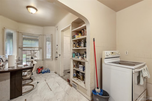 11358 Asbury Park, Detroit, MI 48205 - laundry room with light marble finish flooring and arched walkways