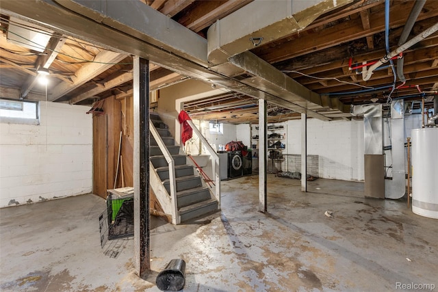 11358 Asbury Park, Detroit, MI 48205 - basement with gas water heater, heating unit, stairs, and washing machine and dryer