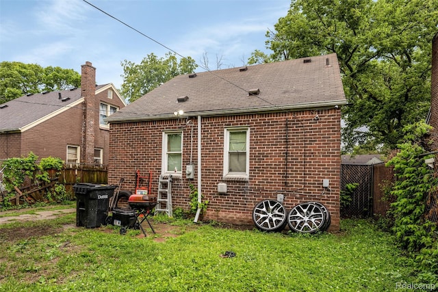 11358 Asbury Park, Detroit, MI 48205 - back of property featuring brick siding and roof with shingles