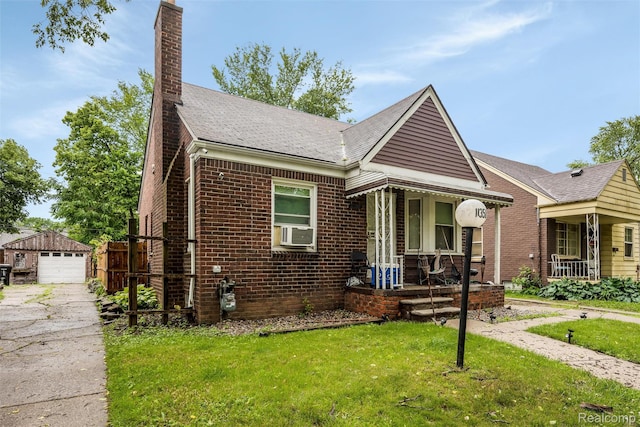 11358 Asbury Park, Detroit, MI 48205 - view of front of house with brick siding, a chimney, a front yard, and an outbuilding