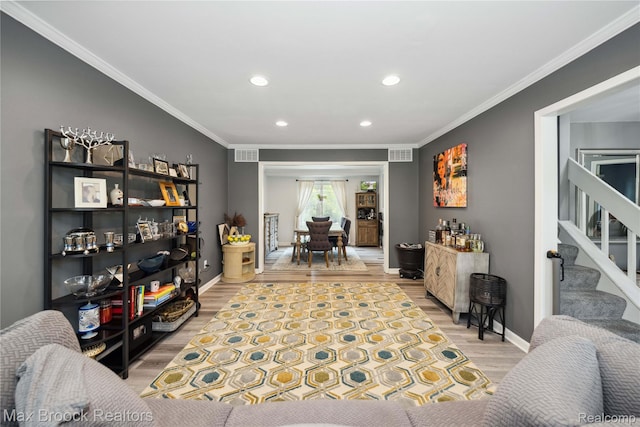 6247 Carpathian Ct, West Bloomfield, MI 48324 - living room with wood finished floors, recessed lighting, crown molding, and stairway