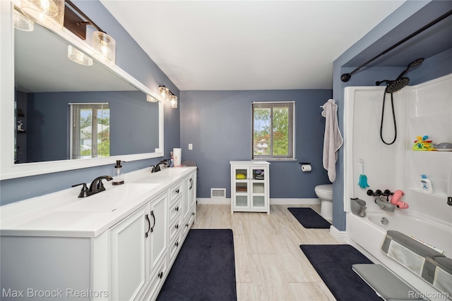 6247 Carpathian Ct, West Bloomfield, MI 48324 - full bathroom featuring double vanity and washtub / shower combination