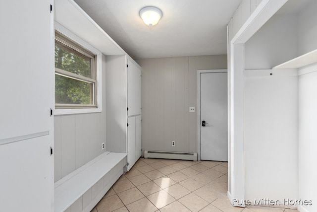 630 Westview Ave NW, Grand Rapids, MI 49504 - bathroom featuring a baseboard heating unit and tile patterned flooring