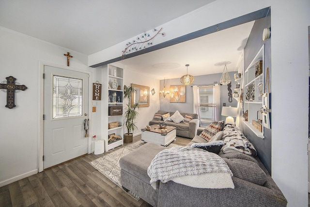 317 E Argyle St, Jackson, MI 49202 - living area featuring wood finished floors and healthy amount of natural light