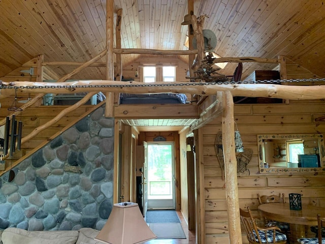 5093 E County Line Rd, Michigan, MI 49411 - interior space with wood ceiling, multiple windows, high vaulted ceiling, and wood walls