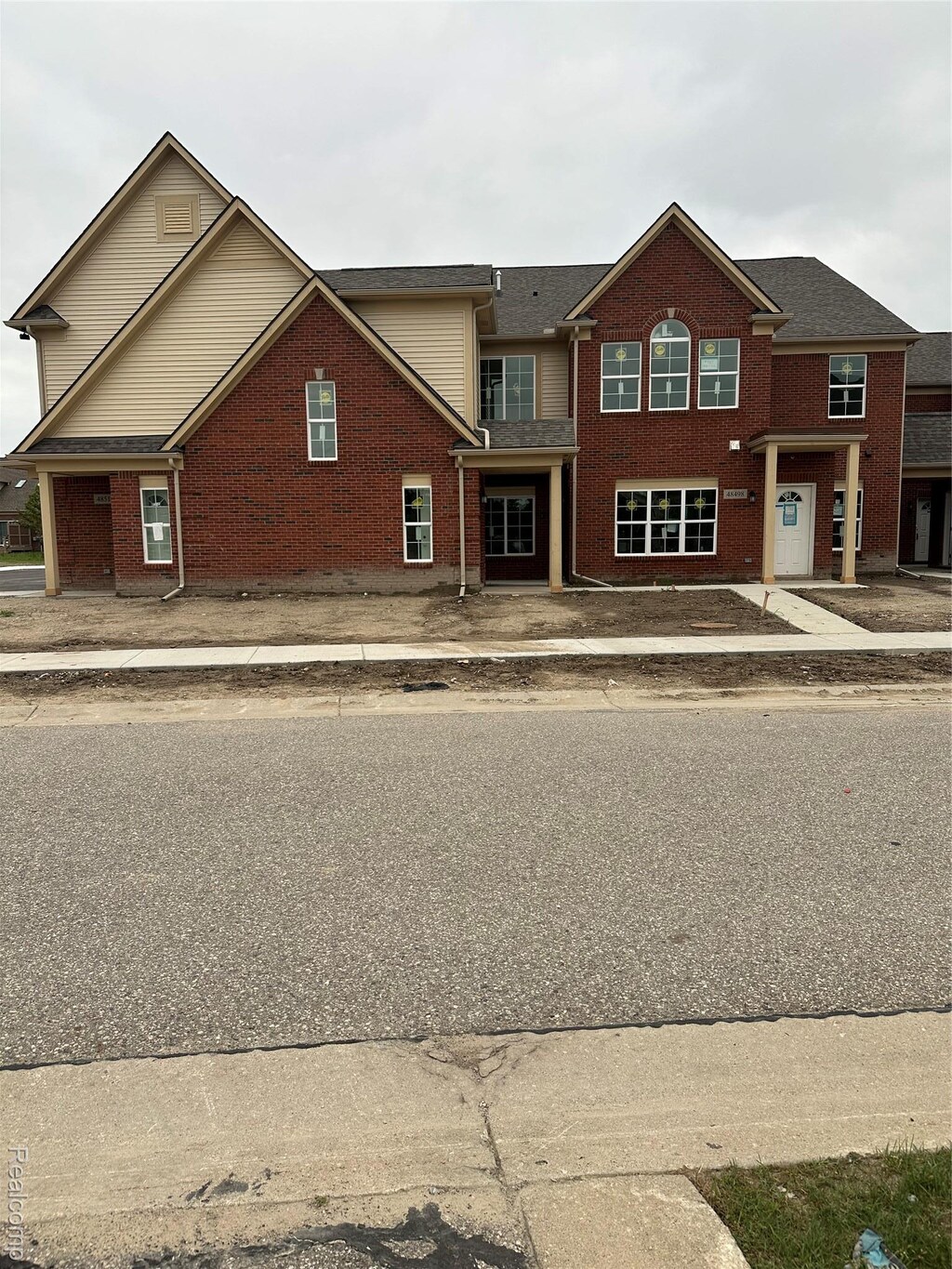 48504 Bridge Way Unit 562, Canton, MI 48188 - traditional home with brick siding