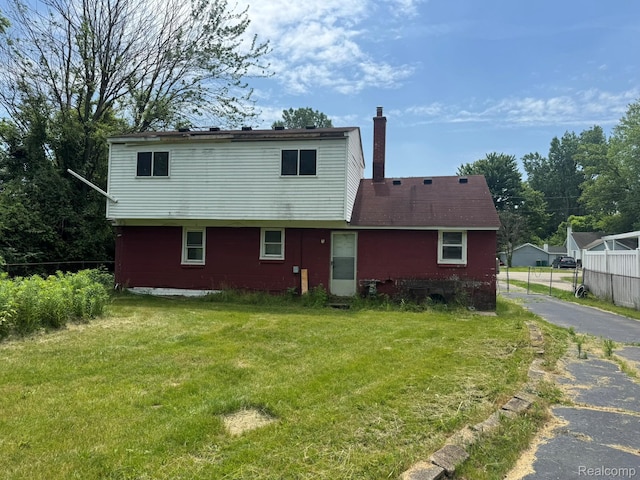 35740 Beverly Rd, Detroit, MI 48174 - back of property featuring a chimney