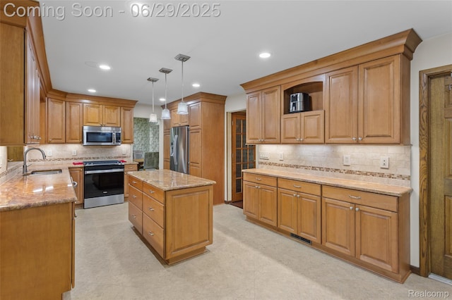 1304 Player Dr, Troy, MI 48085 - kitchen with stainless steel appliances, light stone counters, a kitchen island, tasteful backsplash, and recessed lighting