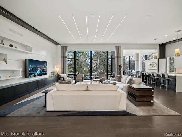 4890 Charing Cross Rd, Bloomfield Hills, MI 48304 - living room with wood finished floors, built in features, and recessed lighting