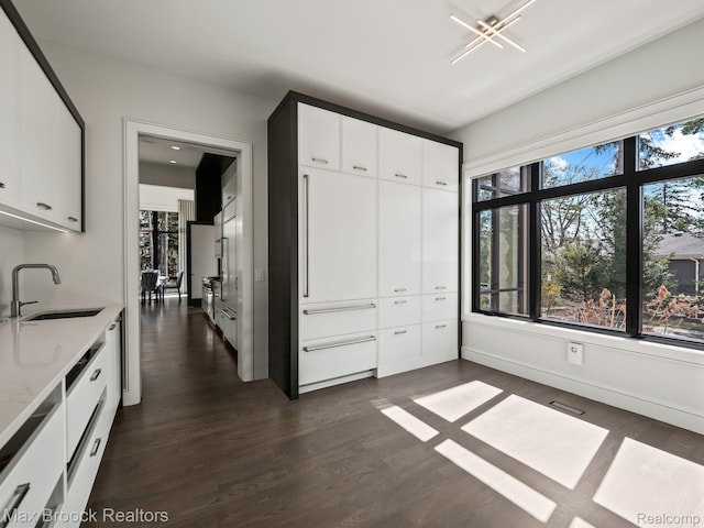 4890 Charing Cross Rd, Bloomfield Hills, MI 48304 - unfurnished bedroom with a sink and dark wood-type flooring