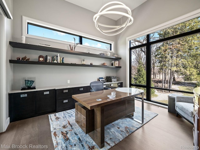 4890 Charing Cross Rd, Bloomfield Hills, MI 48304 - office area with wood finished floors, plenty of natural light, and a chandelier