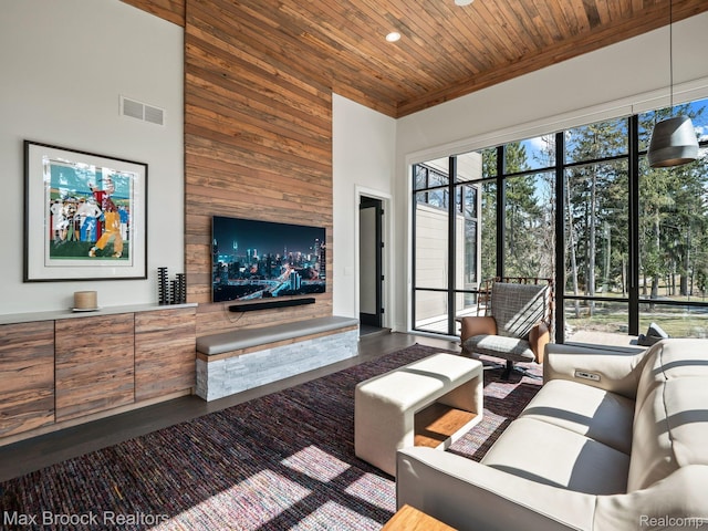 4890 Charing Cross Rd, Bloomfield Hills, MI 48304 - living room featuring wood ceiling, wooden walls, a towering ceiling, dark wood-style floors, and recessed lighting