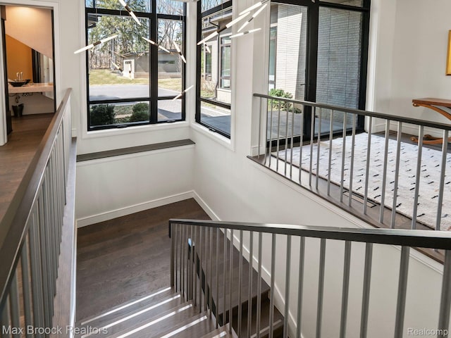 4890 Charing Cross Rd, Bloomfield Hills, MI 48304 - staircase with wood finished floors and baseboards