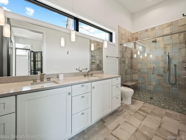 4890 Charing Cross Rd, Bloomfield Hills, MI 48304 - bathroom featuring double vanity and a shower stall