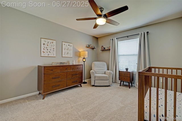 28545 Cottage Ln, New Hudson, MI 48165 - bedroom featuring light carpet, a nursery area, and ceiling fan