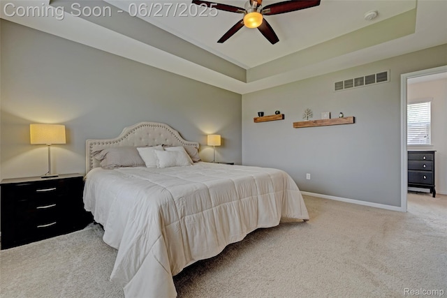 28545 Cottage Ln, New Hudson, MI 48165 - bedroom featuring carpet, a raised ceiling, and ceiling fan