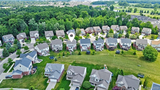 28545 Cottage Ln, New Hudson, MI 48165 - aerial overview of property's location with nearby suburban area
