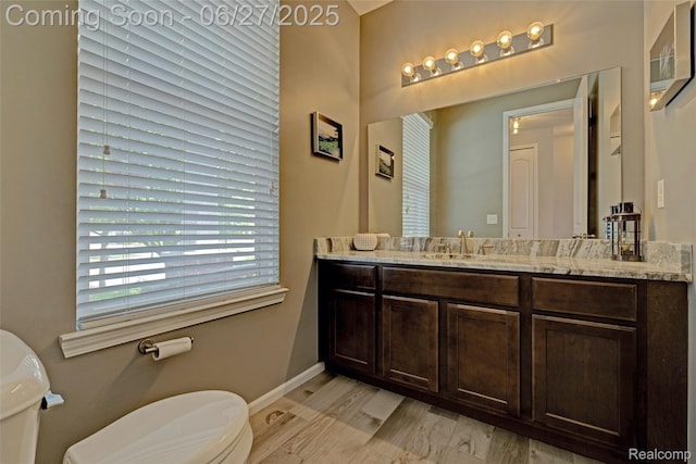 28545 Cottage Ln, New Hudson, MI 48165 - bathroom with vanity and wood finished floors