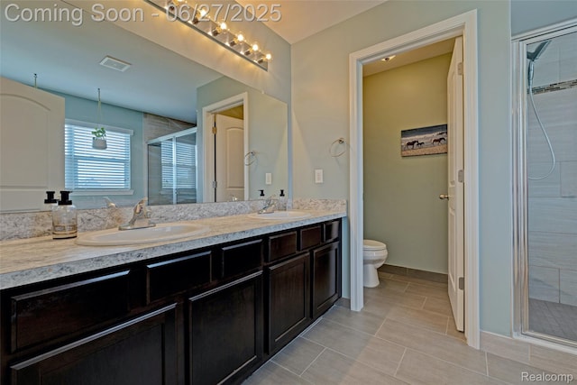 28545 Cottage Ln, New Hudson, MI 48165 - full bathroom featuring a shower stall, double vanity, and tile patterned flooring