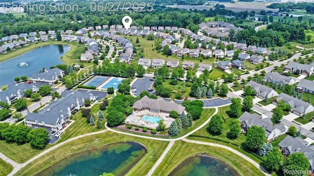 28545 Cottage Ln, New Hudson, MI 48165 - aerial overview of property's location featuring a nearby body of water and nearby suburban area