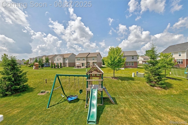 28545 Cottage Ln, New Hudson, MI 48165 - view of property's community featuring a playground, a residential view, and a yard