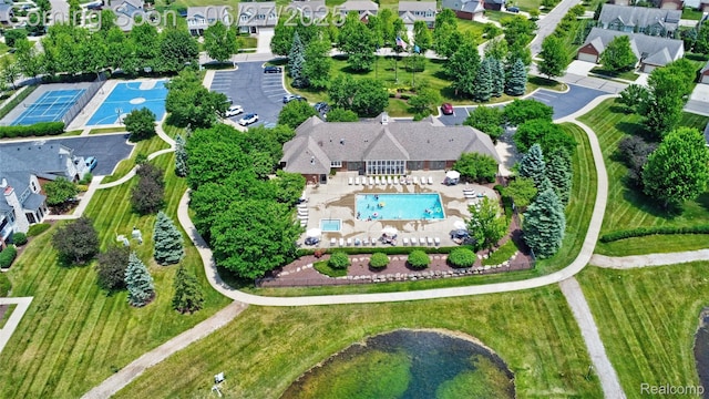 28545 Cottage Ln, New Hudson, MI 48165 - aerial view of property and surrounding area featuring a pool and nearby suburban area