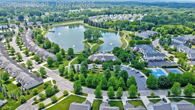 28545 Cottage Ln, New Hudson, MI 48165 - aerial perspective of suburban area featuring a large body of water