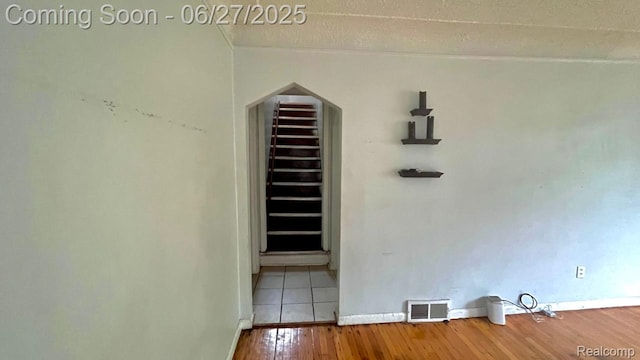 12857 Robson St, Detroit, MI 48227 - detailed view of wood finished floors and arched walkways