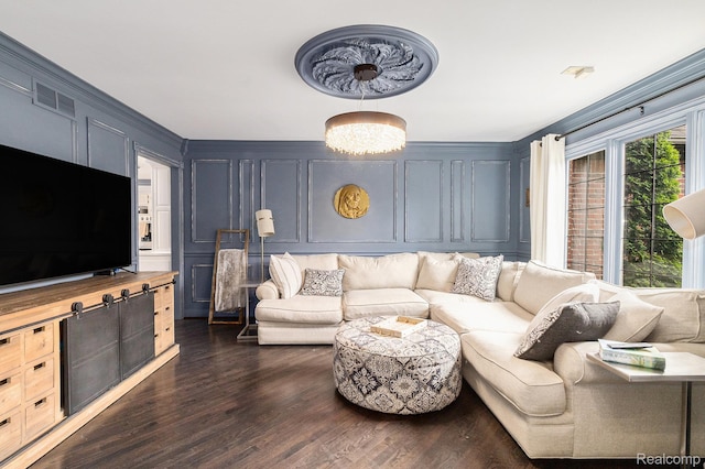 50530 Hunters Creek Trl, Shelby Twp, MI 48317 - living area featuring a decorative wall and dark wood finished floors