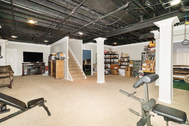 50530 Hunters Creek Trl, Shelby Twp, MI 48317 - workout room with decorative columns, carpet flooring, and crown molding