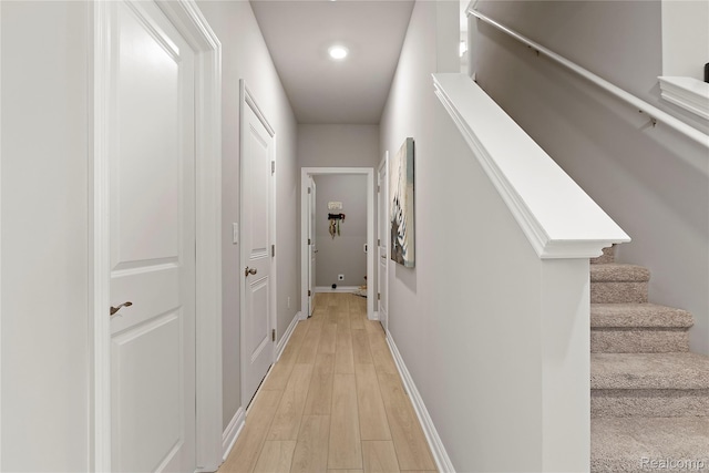 2270 Chase Dr Unit 112, Howell, MI 48855 - corridor with light wood finished floors, stairway, and recessed lighting
