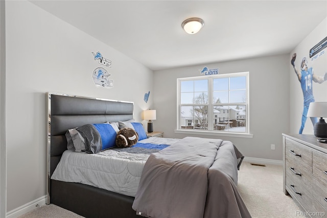 2270 Chase Dr Unit 112, Howell, MI 48855 - bedroom featuring light carpet