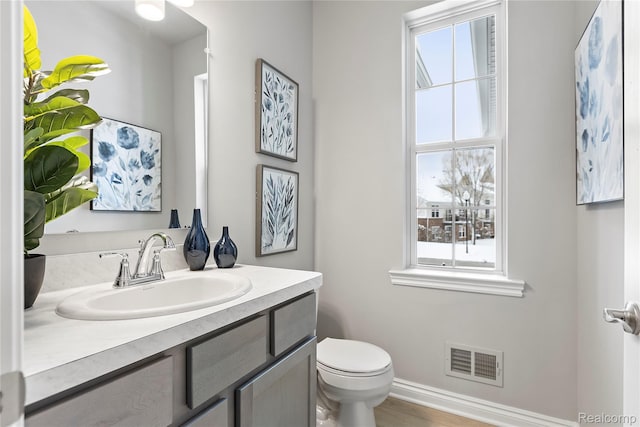 2270 Chase Dr Unit 112, Howell, MI 48855 - half bathroom with vanity and toilet