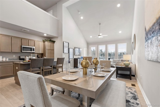 2270 Chase Dr Unit 112, Howell, MI 48855 - dining space featuring high vaulted ceiling, a ceiling fan, light wood-style floors, and recessed lighting