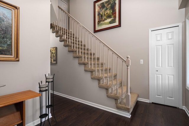 7662 Hidden Ponds Blvd, Brighton, MI 48114 - stairway with wood finished floors and baseboards