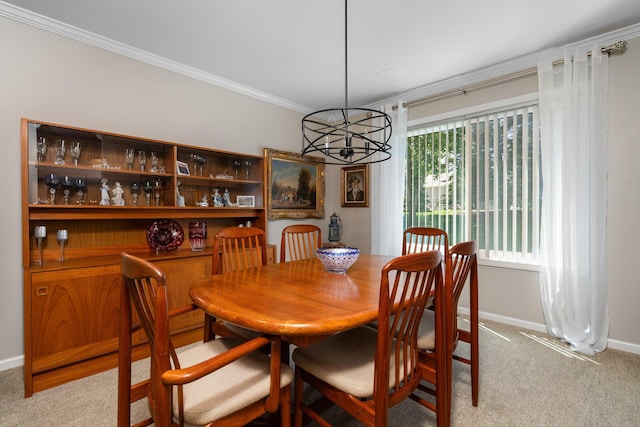 7662 Hidden Ponds Blvd, Brighton, MI 48114 - dining room with light carpet, a chandelier, and ornamental molding