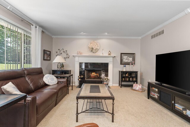 7662 Hidden Ponds Blvd, Brighton, MI 48114 - living room with ornamental molding, carpet floors, and a tiled fireplace
