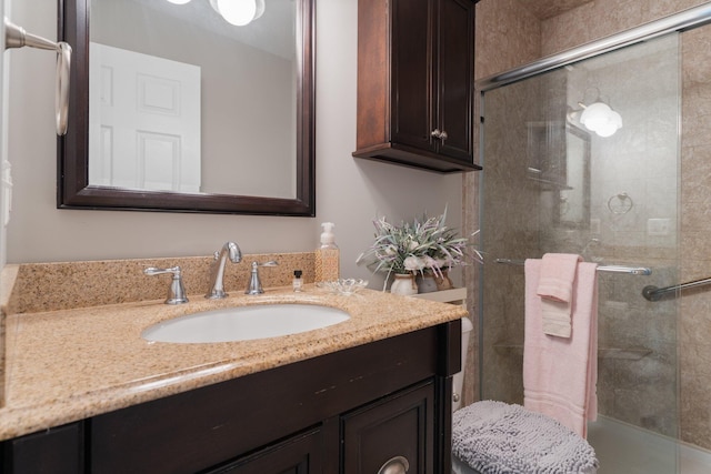 7662 Hidden Ponds Blvd, Brighton, MI 48114 - bathroom featuring a tile shower and vanity