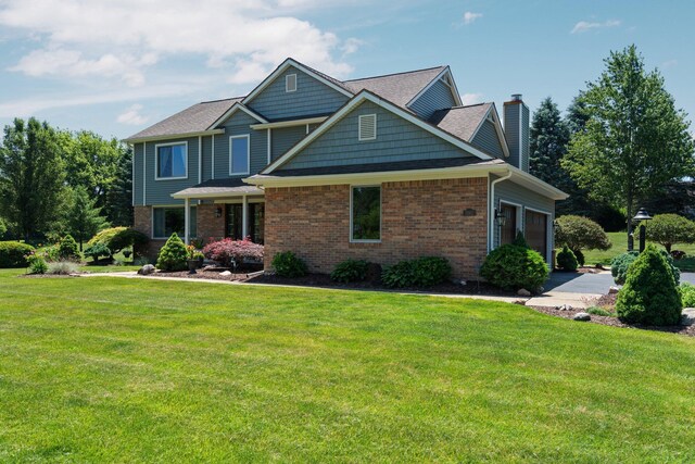 7662 Hidden Ponds Blvd, Brighton, MI 48114 - craftsman-style home featuring a chimney, brick siding, and a front yard