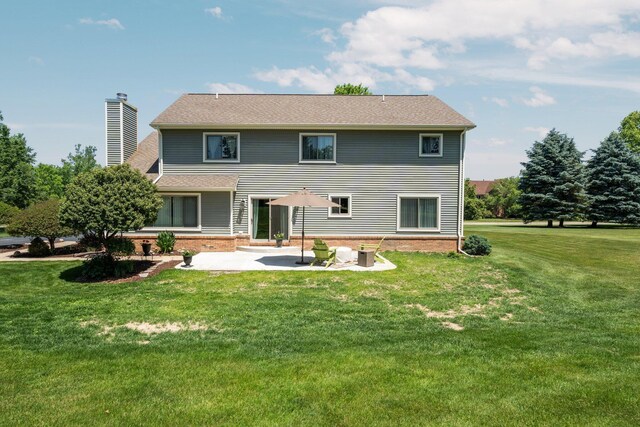 7662 Hidden Ponds Blvd, Brighton, MI 48114 - rear view of property with a patio, a chimney, and a yard
