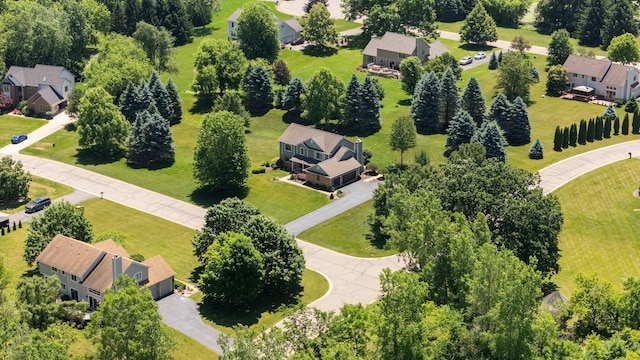 7662 Hidden Ponds Blvd, Brighton, MI 48114 - aerial perspective of suburban area